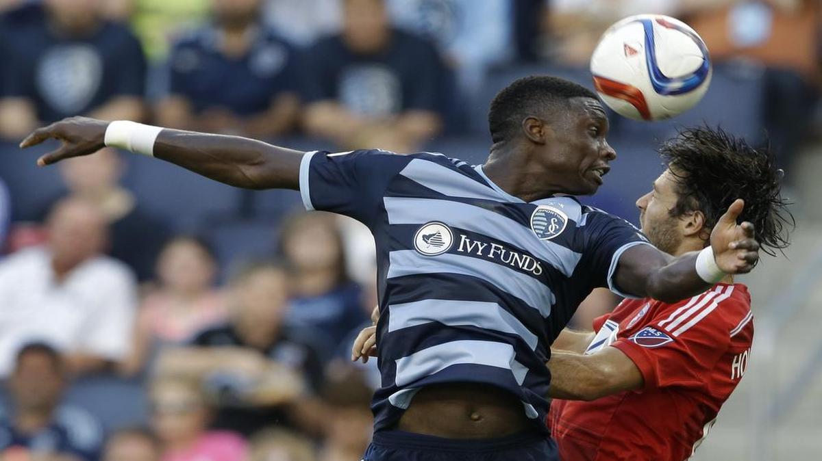 
Sporting Kansas City defender Jalil Anibaba headed the ball against FC Dallas midfielder Ryan Hollingshead during a game on July 1.
