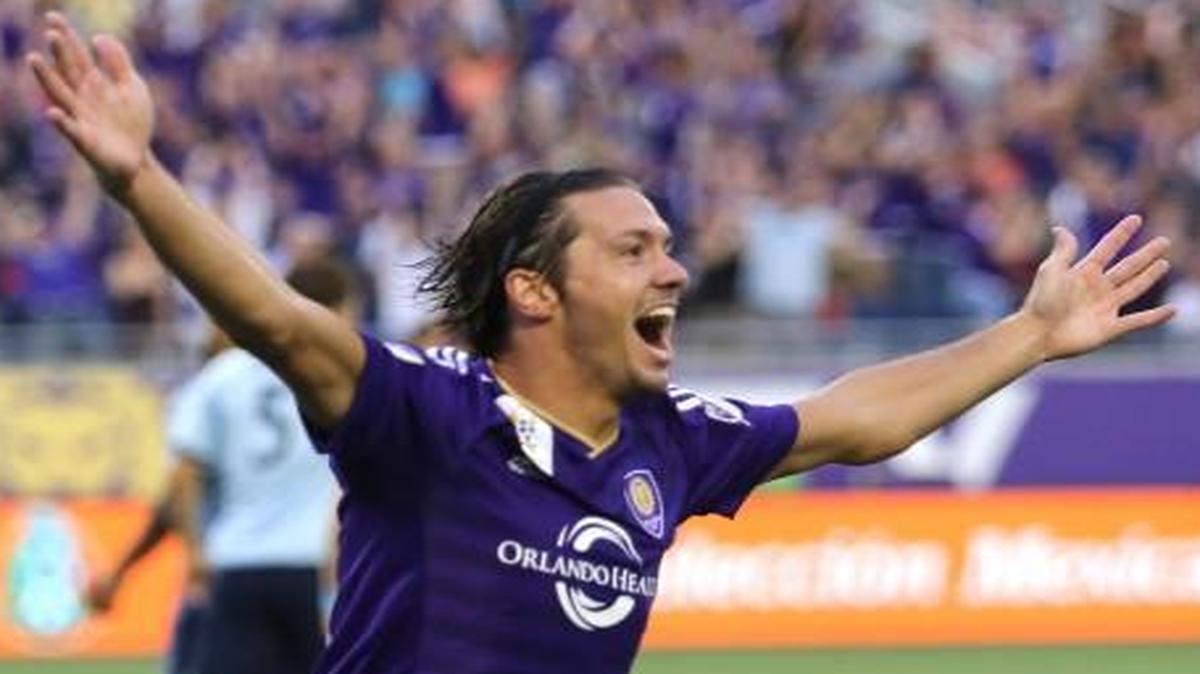 
Adrian Winter of Orlando City FC celebrated one of two goals he scored against Sporting Kansas City on Sunday night in Orlando, Fla. Orlando City won the match 3-1.
