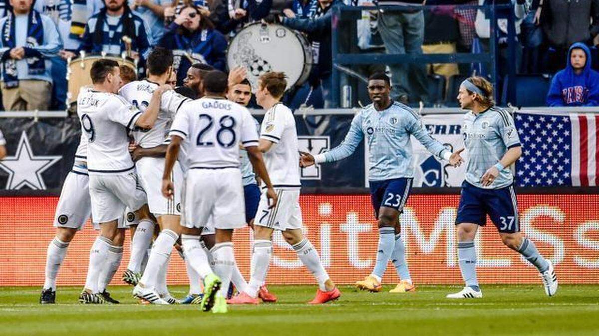 
Sporting Kansas City defender Jalil Anibaba (23) and his teammate forward Jacob Peterson (37) watched while the Philadelphia Union celebrated a goal in the first half Sunday at Sporting Park.
