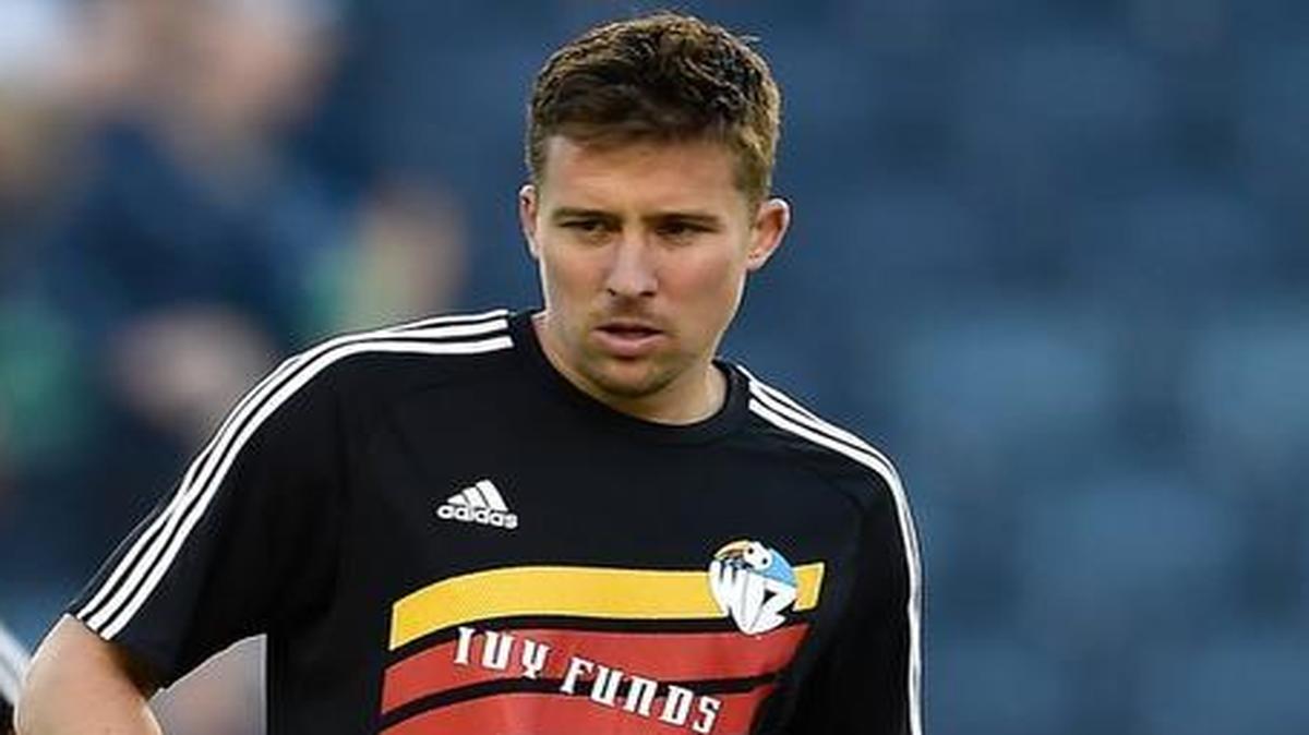 Matt Besler (right) was among the players honored Wednesday night as Sporting Kansas City announced its all-time Best XI. To honor the 20th anniversary of the franchise, Besler, Roger Espinosa and their teammates wore warmup jerseys similar to the uniforms that the Kansas City Wiz wore in their inaugural season in 1996 before Wednesday night’s match against the Colorado Rapids at Children’s Mercy Park.