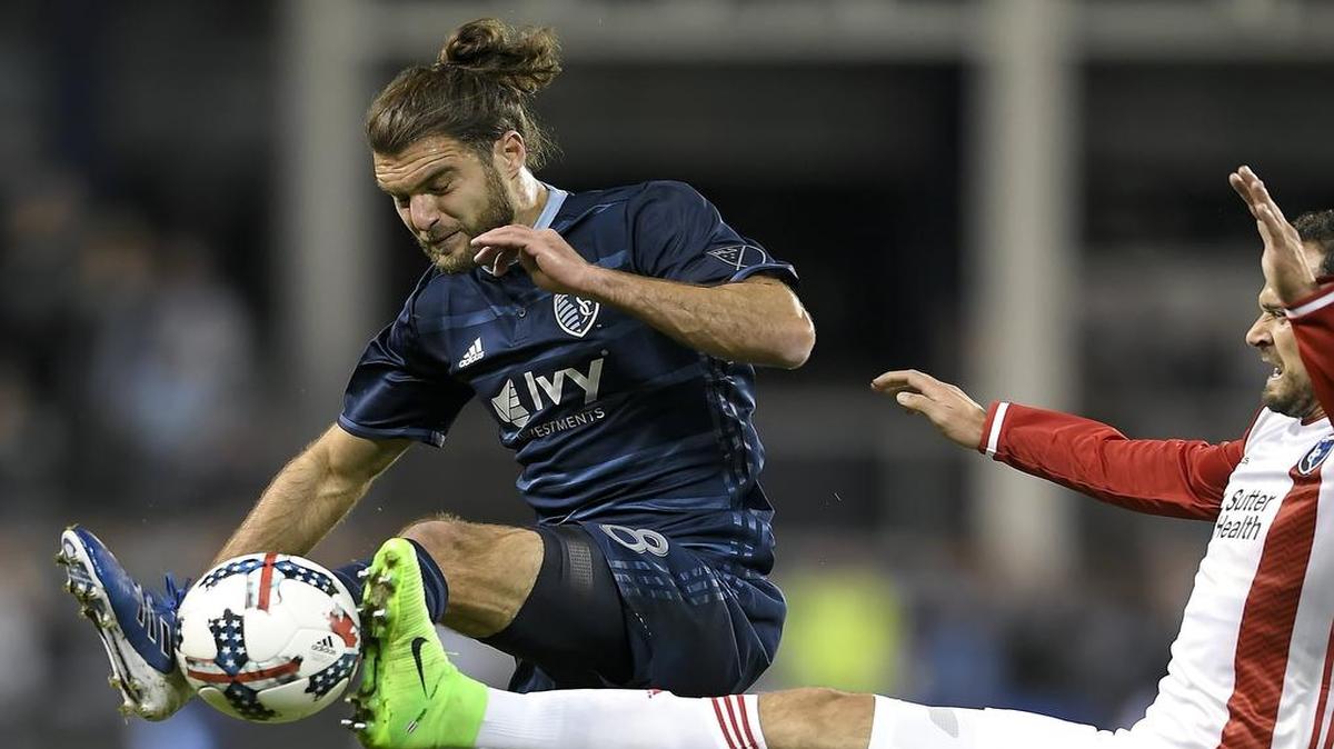 Midfielder Graham Zusi and Sporting KC are set to take on Toronto FC on Friday night.