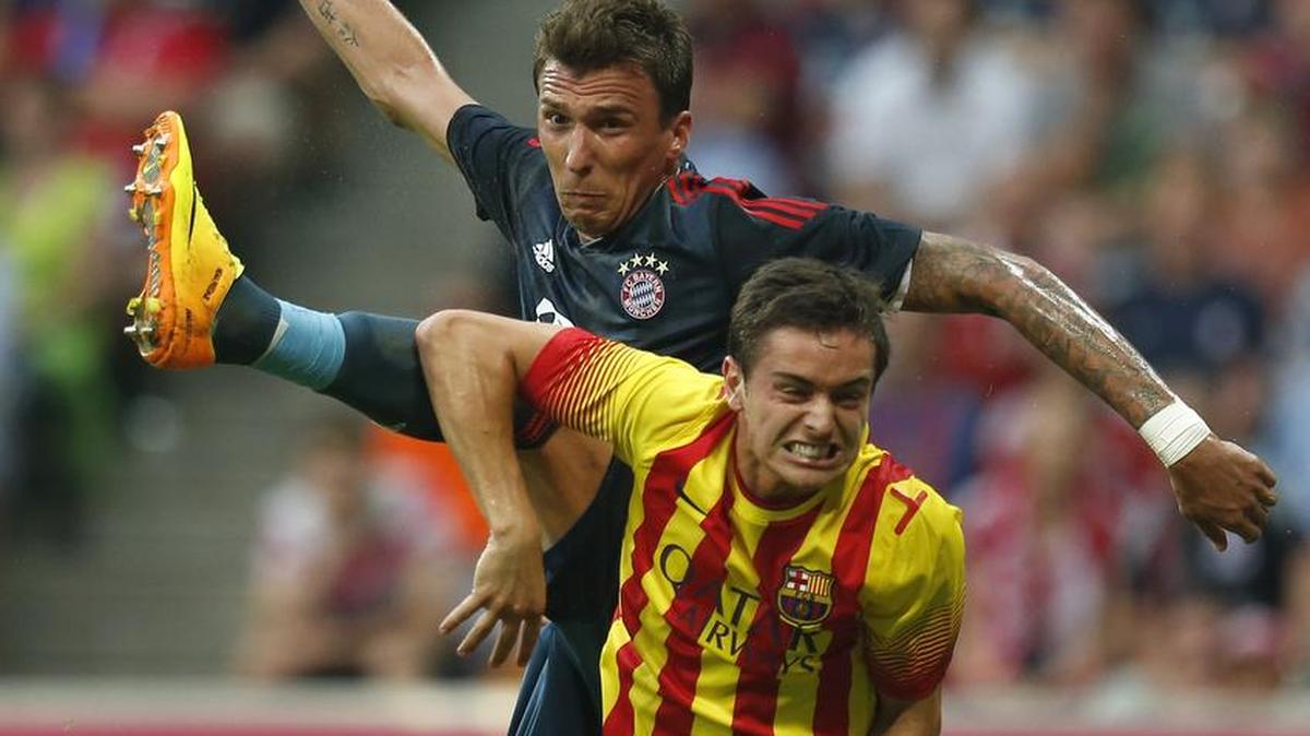 
Barcelona’s Jordi Quintilla (bottom) last played for the French club AC Ajaccio as a midfielder.
