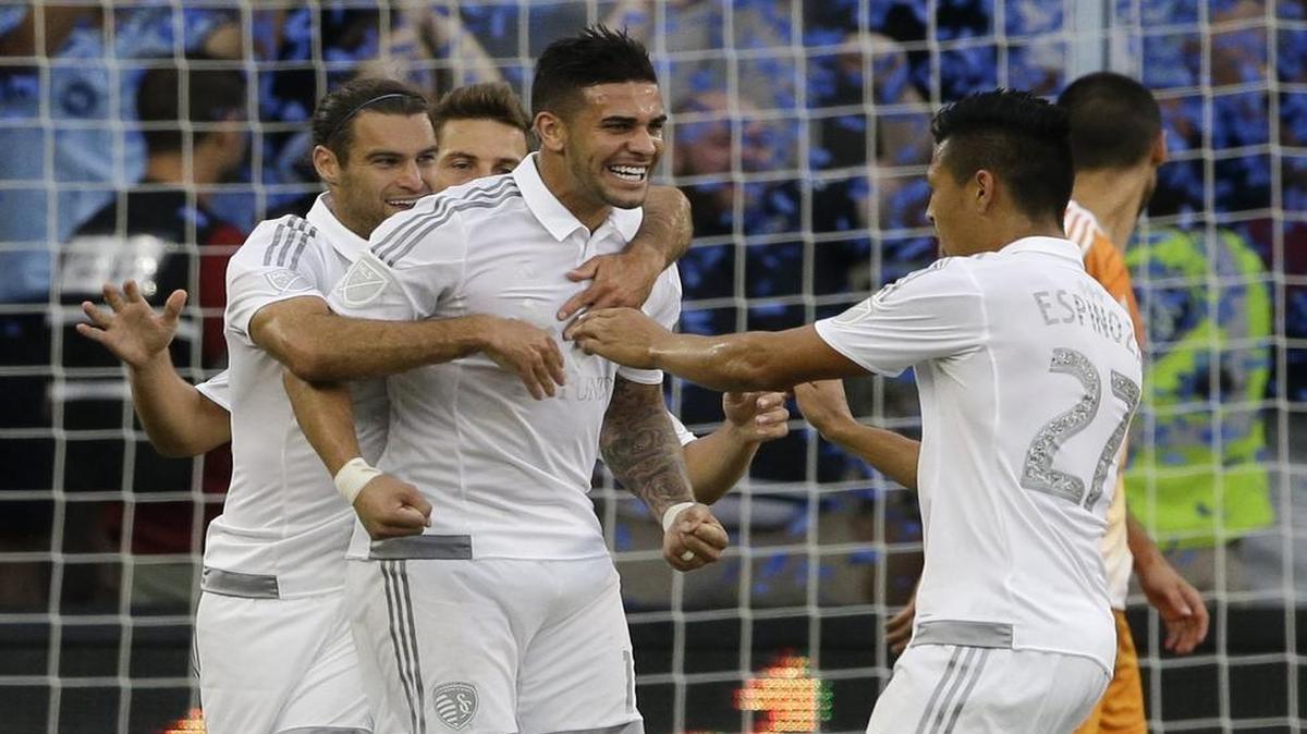 
Sporting Kansas City forward Dom Dwyer (center) scored on Saturday night against the Houston Dynamo, but he also received a yellow card in the first half. As a result, he will miss the club’s match next Saturday in Toronto due to yellow card accumulation. 
