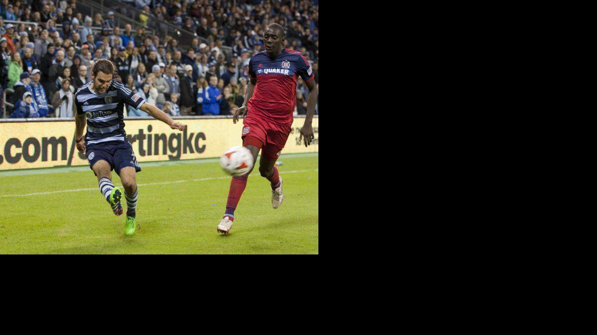 
Graham Zusi sends this cross for an assist on a goal by Dom Dwyer during the soccer match between The Chicago Fire and Sporting KC at Sporting Park in Kansas City, KS on October 10, 2015 SKC won 2-0 to clinch a playoff spot.
