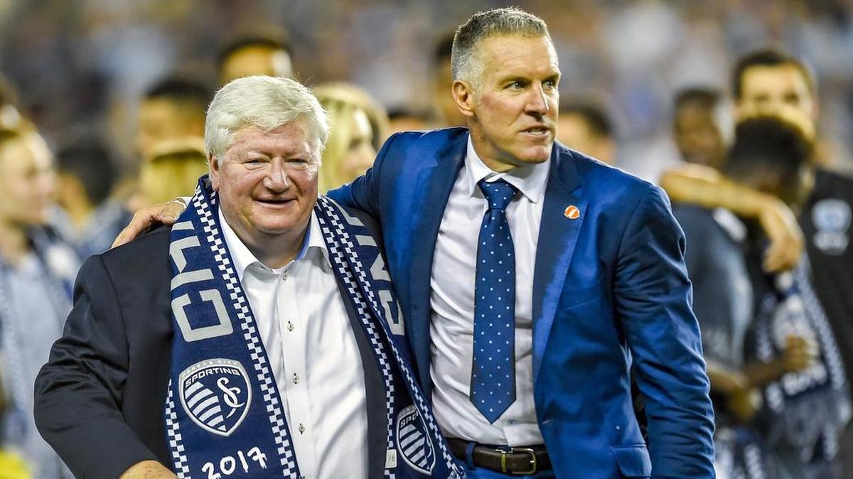 Sporting Kansas City coach Peter Vermes (right) celebrated this year’s U.S. Open Cup championship victory with Sporting KC co-owner Cliff Illig.