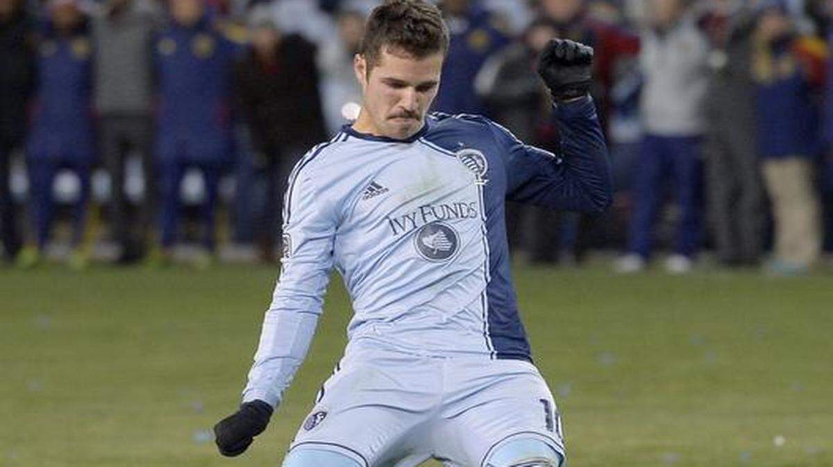 
Sporting KC midfielder Benny Feilhaber (10) makes the third penalty kick against Real Salt Lake during the MLS Cup Final on Dec. 7, 2013, in Kansas City, Kan.

