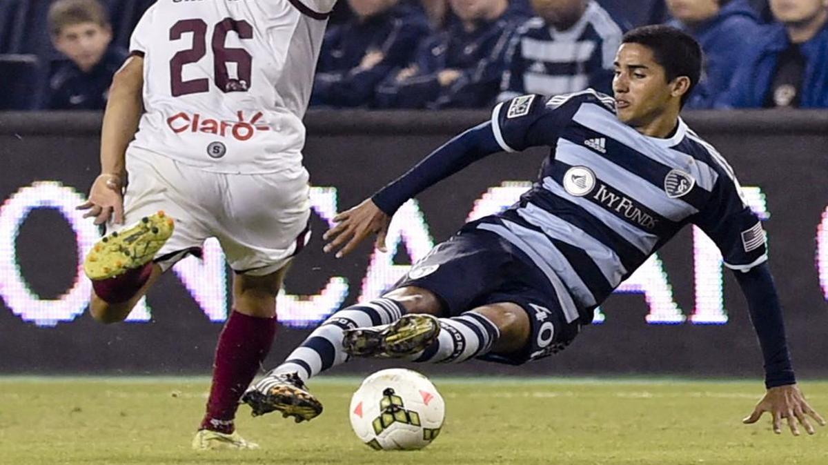 Sporting KC defender Igor Juliao (right) during a game in 2014.