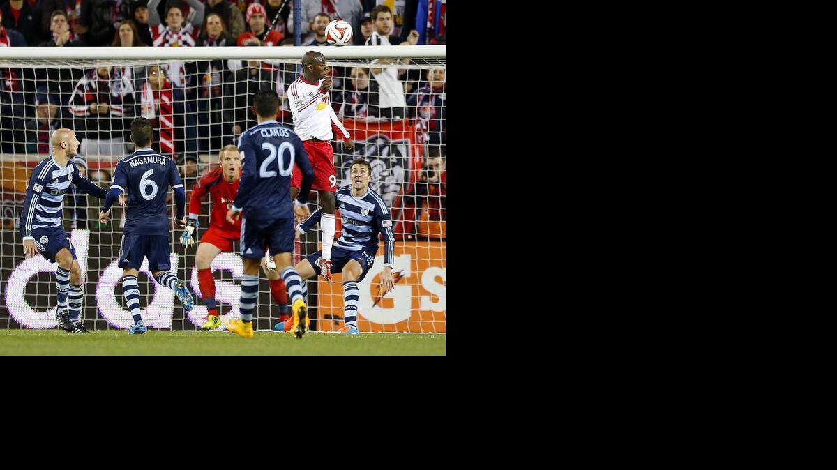 
New York Red Bulls forward Bradley Wright-Phillips (99) headed a cornerkick in for a goal for the winning score against Sporting Kansas City in an MLS playoff soccer match at Red Bull Arena in Harrison, N.J., Thursday, Oct. 30, 2014. The Red Bulls defeated Kansas City 2-1.
