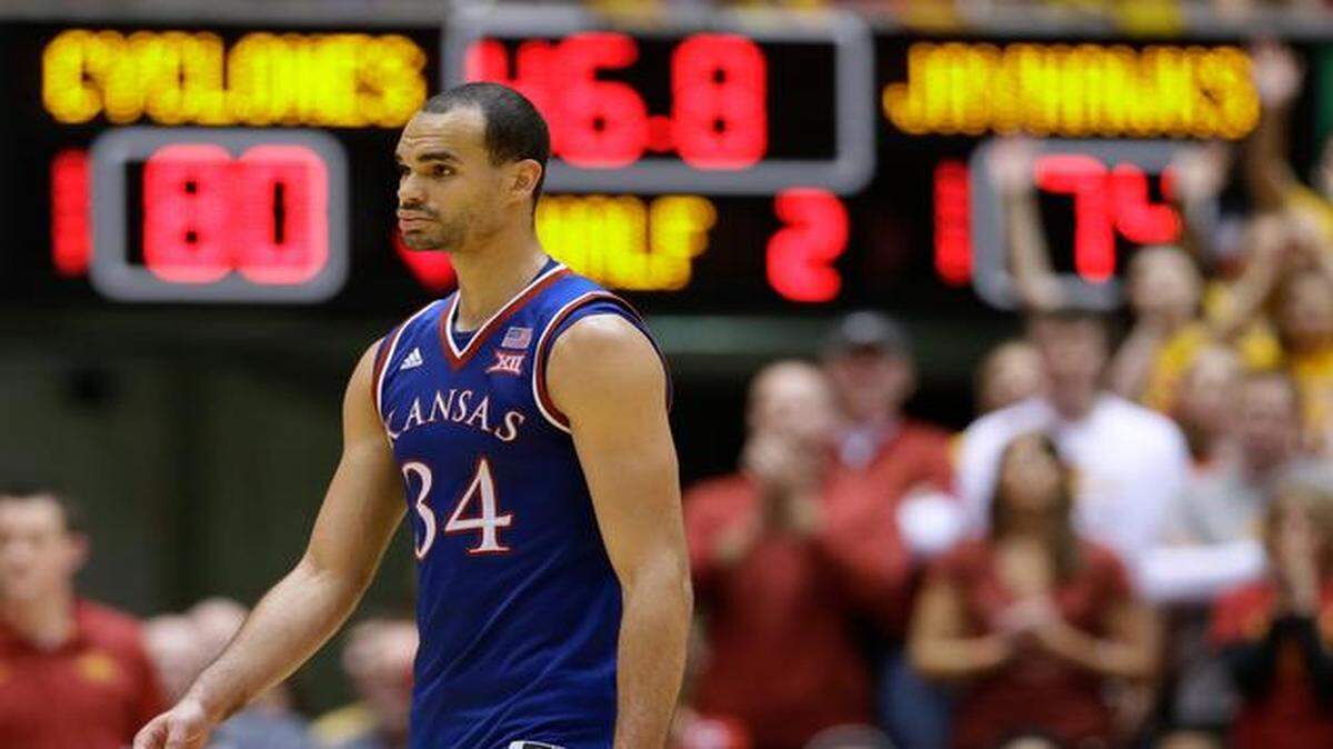 
KU forward Perry Ellis walked to the bench after fouling out in the second half of Saturday’s game against Iowa State.
