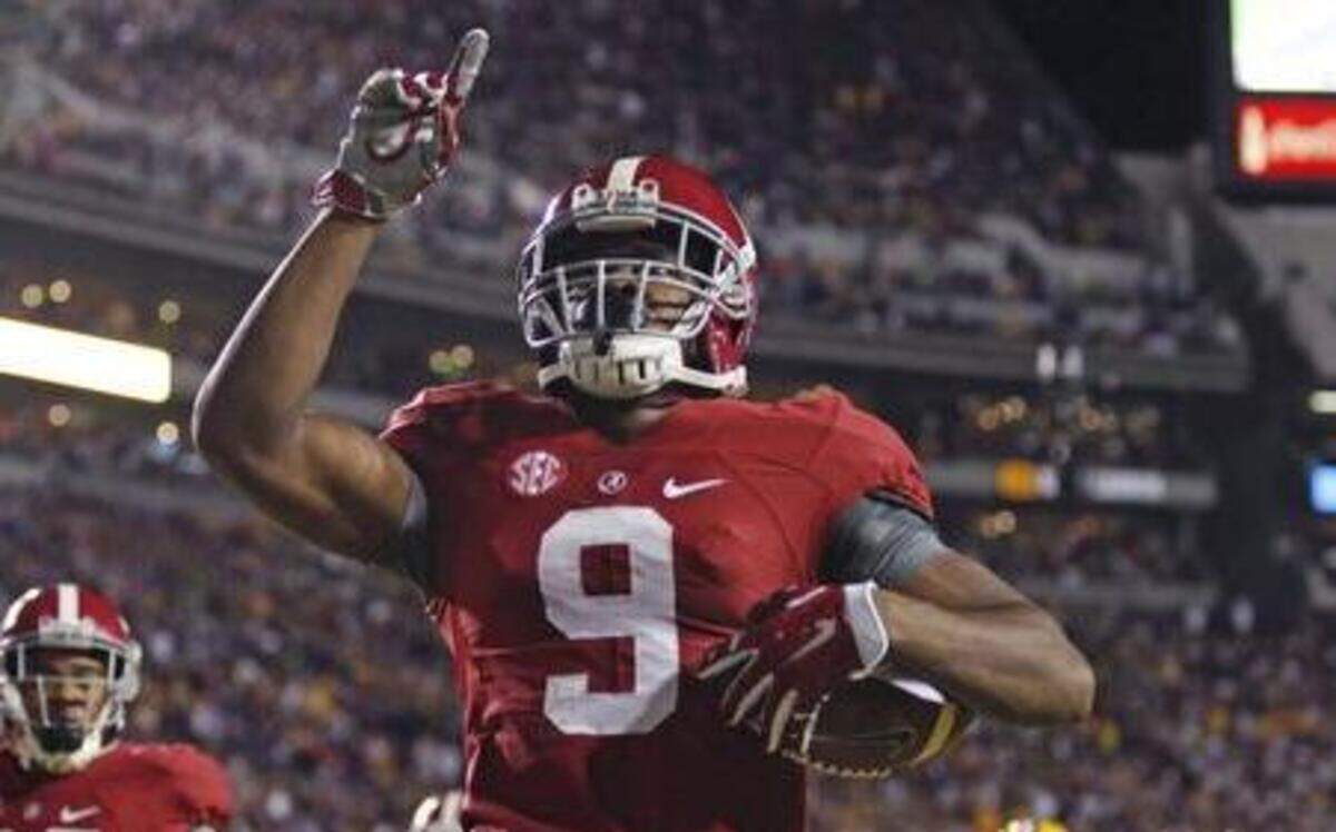 
Alabama wide receiver Amari Cooper (9) celebrated his 23-yard touchdown reception in the first half against LSU on Saturday. Alabama is No. 1 in the country when it comes to Facebook likes of college football, according to The New York Times.


