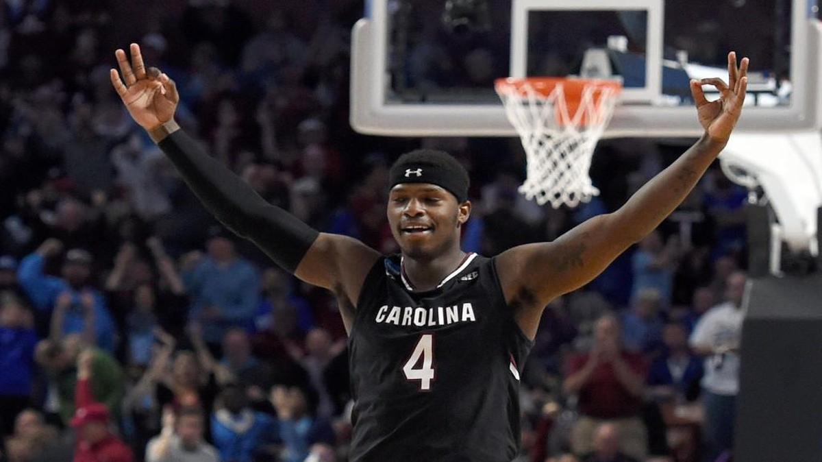 South Carolina’s Rakym Felder (4) reacts after making a three-point basket against Duke during the second half in a second-round game of the NCAA men’s basketball tournament in Greenville, S.C., Sunday.