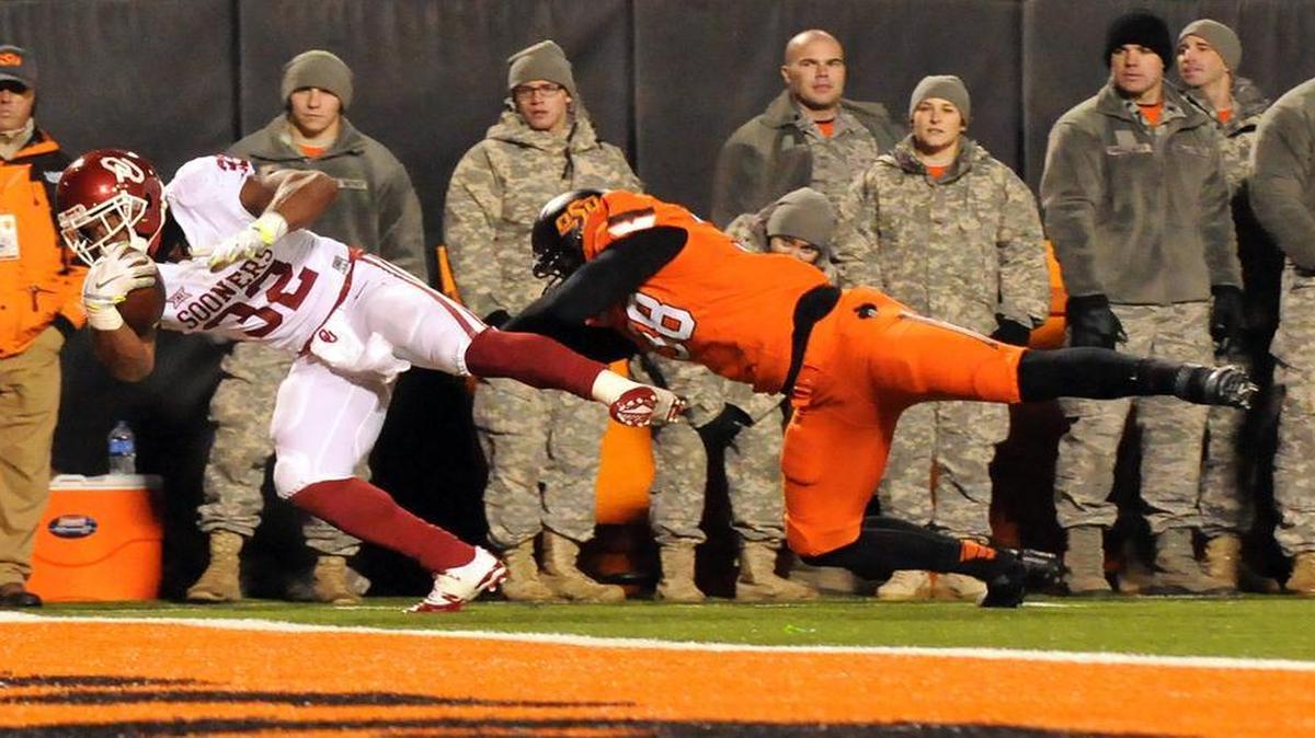 Oklahoma running back Samaje Perine scored during the Sooners’ win over Oklahoma State last week, which was probably enough to get them into the College Football Playoff.