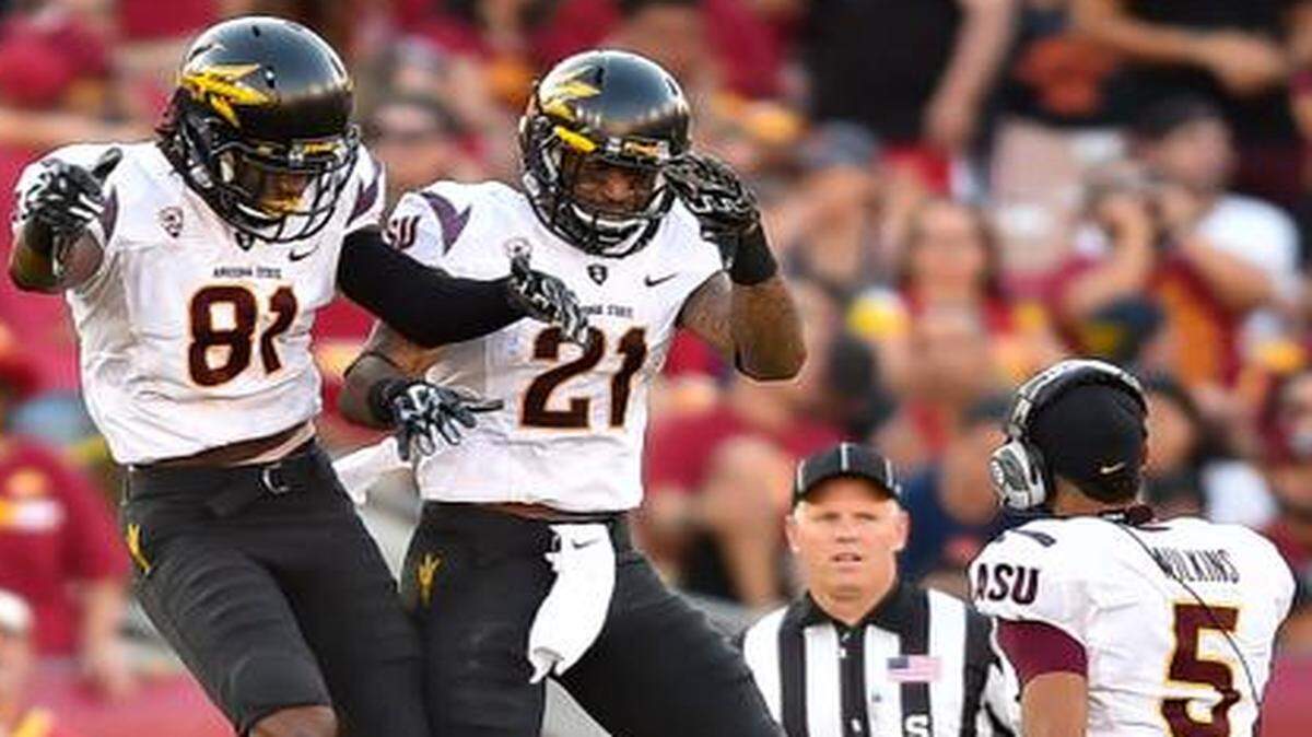 Arizona State wide receiver Gary Chambers (81) celebrates teammate wide receiver Jaelen Strong's (21) touchdown. The Wildcats jumped from unranked to top ten with a surprise win Saturday night.