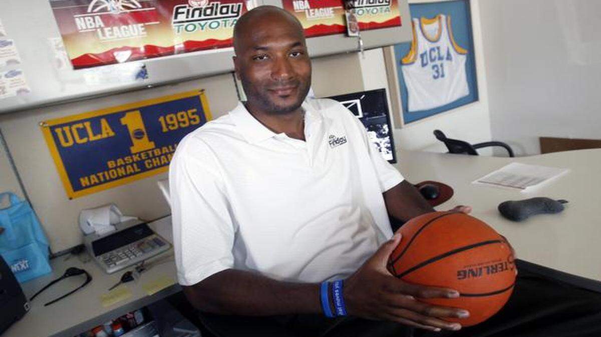 
In this Sept. 18, 2010, file photo, former UCLA basketball player Ed O’Bannon Jr. sat in his office in Henderson, Nev. A federal judge ruled Friday that the NCAA can’t stop college football and basketball players from selling the rights to their names and likenesses, opening the way to athletes getting payouts once their college careers are over.
