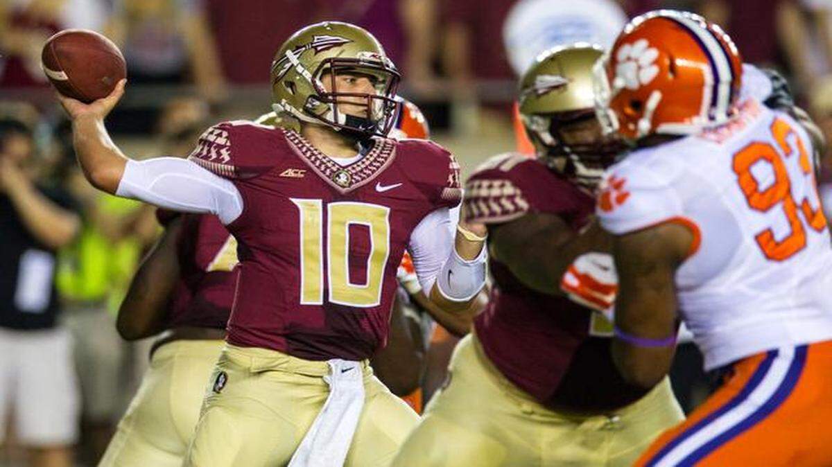 
With Heisman Trophy-winning quarterback Jameis Winston serving a one-game suspension, his replacement, Sean Maguire (10) led the Florida State Seminoles to a 23-27 overtime victory over the Clemson Tigers on Saturday night in Tallahassee, Fla.
