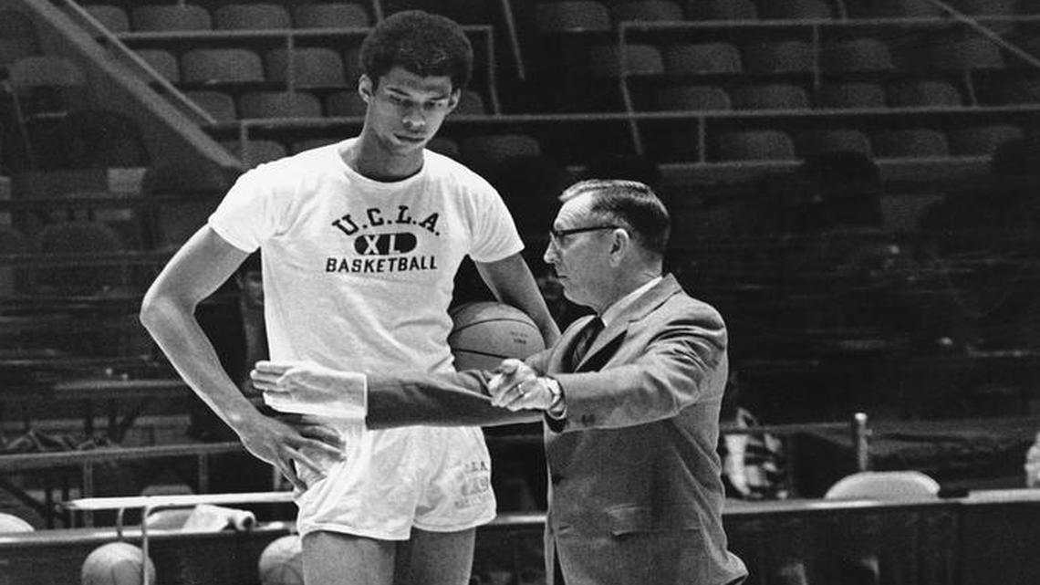 Lew Alcindor, now known as Kareem Abdul-Jabbar, talked with coach John Wooden during their days at UCLA.