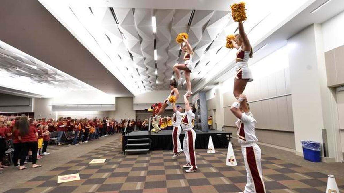 
Iowa State University cheerleaders led a cheer on Thursday, March 12, 2015, during a pep rally for Iowa State at Bartle Hall in Kansas City before Iowa State played Texas on Thursday in the quarterfinals of the Big 12 men’s basketball tournament at the Sprint Center. The semifinals continue on Friday.
