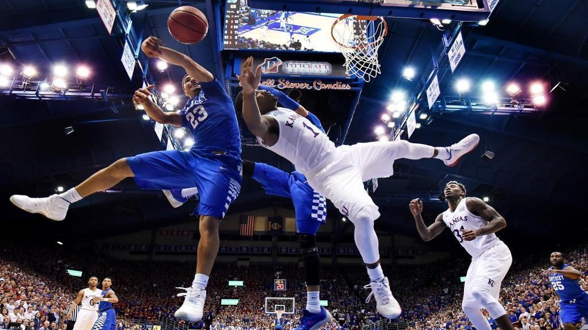 KU's Wayne Selden was fouled by Kentucky's Jamal Murray during Saturday night’s Big 12-SEC Challenge game in Allen Fieldhouse. The Jayhawks won 90-84 in overtime.