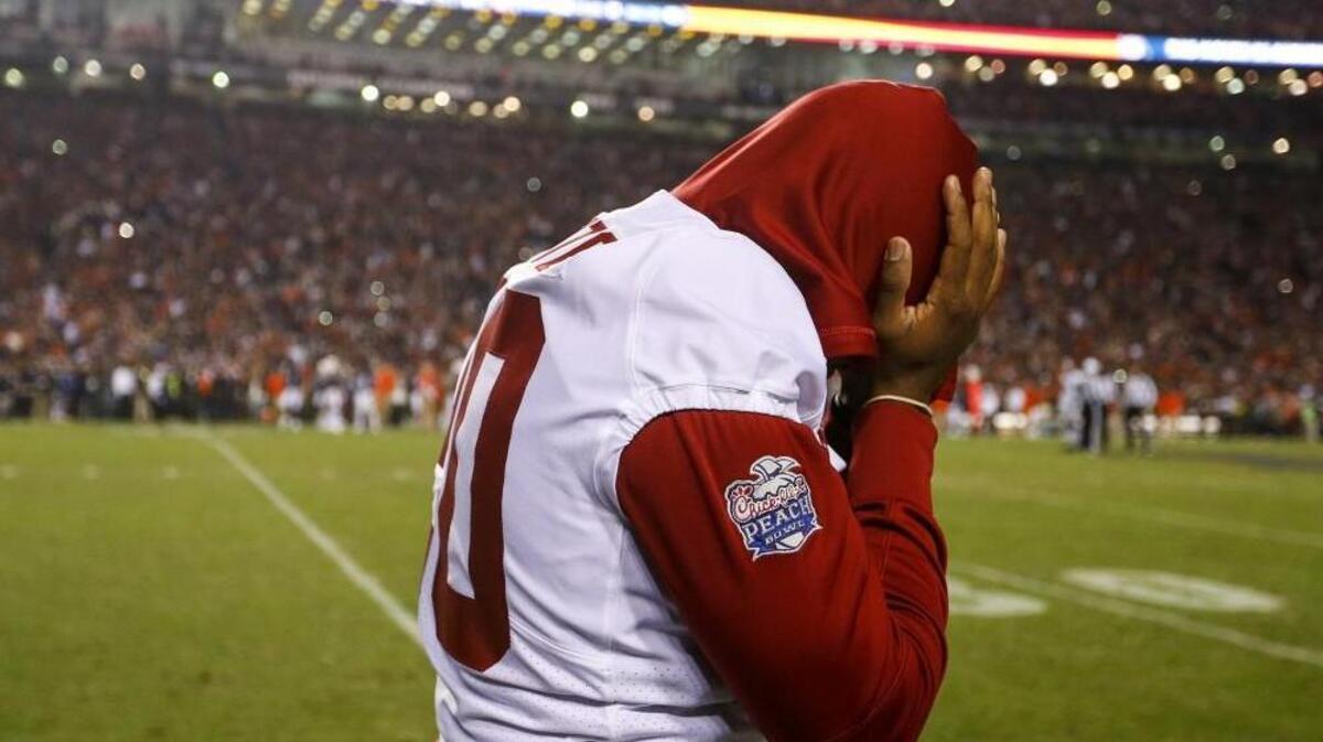 Alabama linebacker Shaun Dion Hamilton embodied the disappointment of his team and fan base after the Crimson Tide’s loss to Auburn in the Iron Bowl on Saturday.