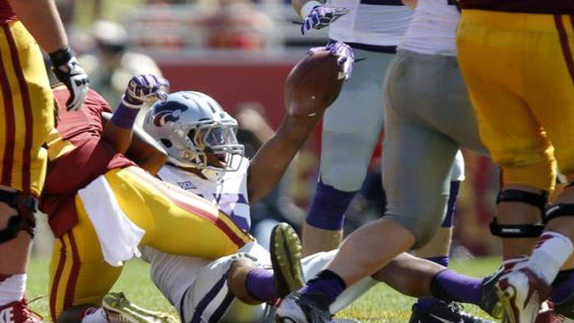 
Kansas State defensive back Randall Evans celebrated after ripping the ball away from Iowa State wide receiver Jarvis West for an interception in the fourth quarter on Saturday.

