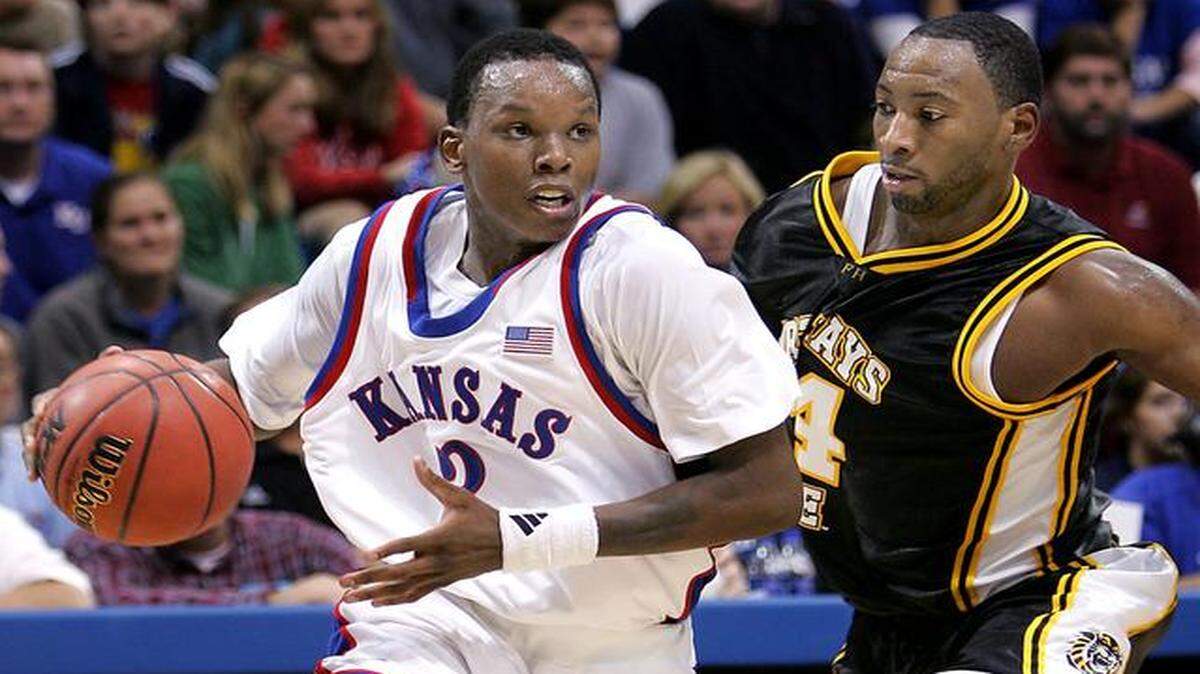 Russell Robinson started three of four years at point guard for KU and ranks ninth on the school’s career assist chart and fifth in steals.