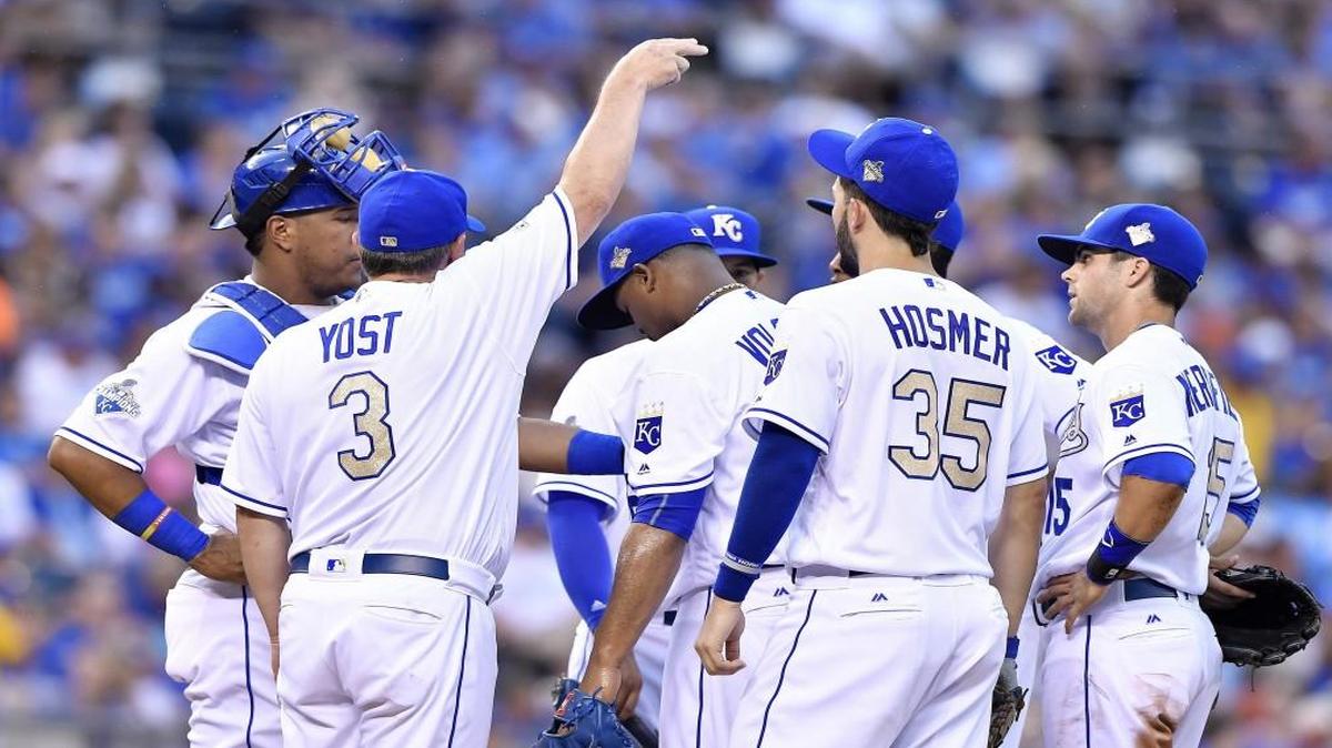 Kansas City Royals manager Ned Yost signals for a reliever over starting pitcher Edinson Volquez in the second inning of Friday’s game against the Houston Astros at Kauffman Stadium.
