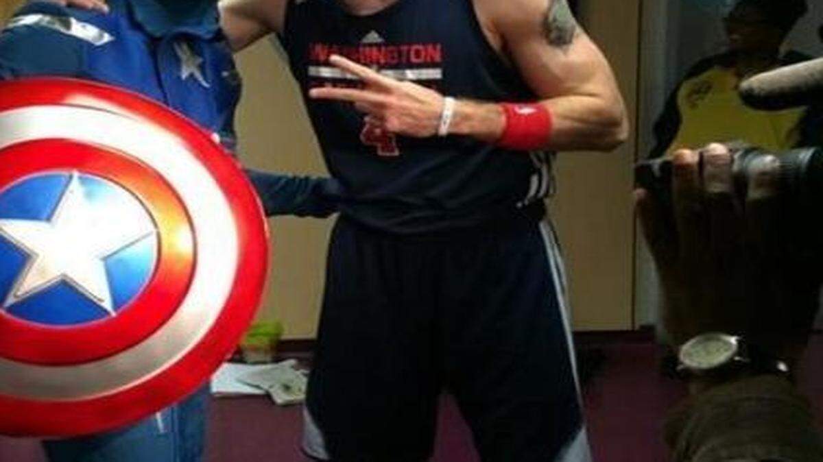 
Paul Pierce, er, Captain America posed with the Wizards’ Marcin Gortat. 
