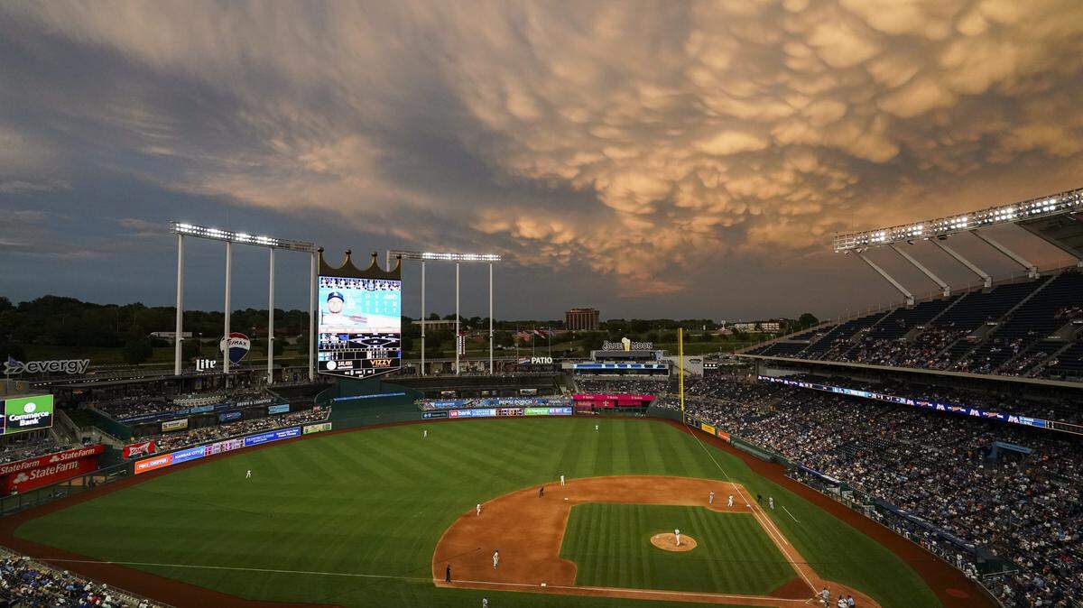 A general view of the sky lighting up as the Kansas City Royals take on the Los Angeles Dodgers during the second inning at Kauffman Stadium on July 1, 2023 in Kansas City, Missouri.