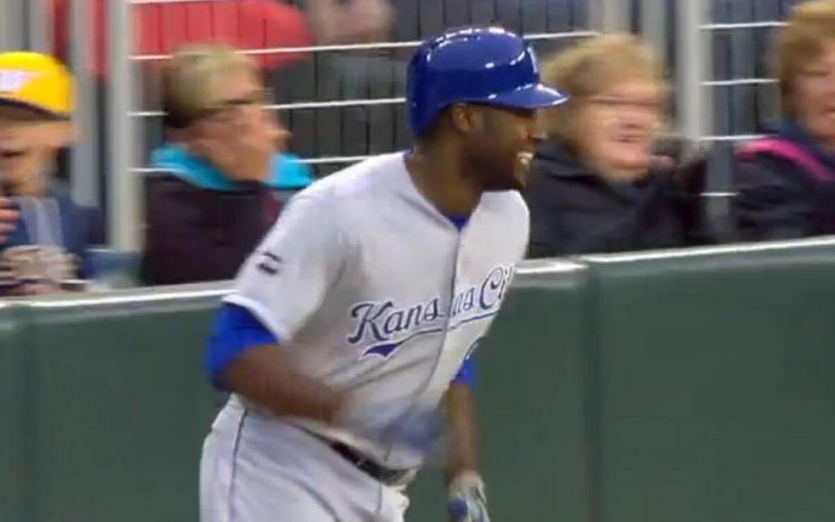 Kansas City Royals outfielder Lorenzo Cain smiled after greeting the kid.