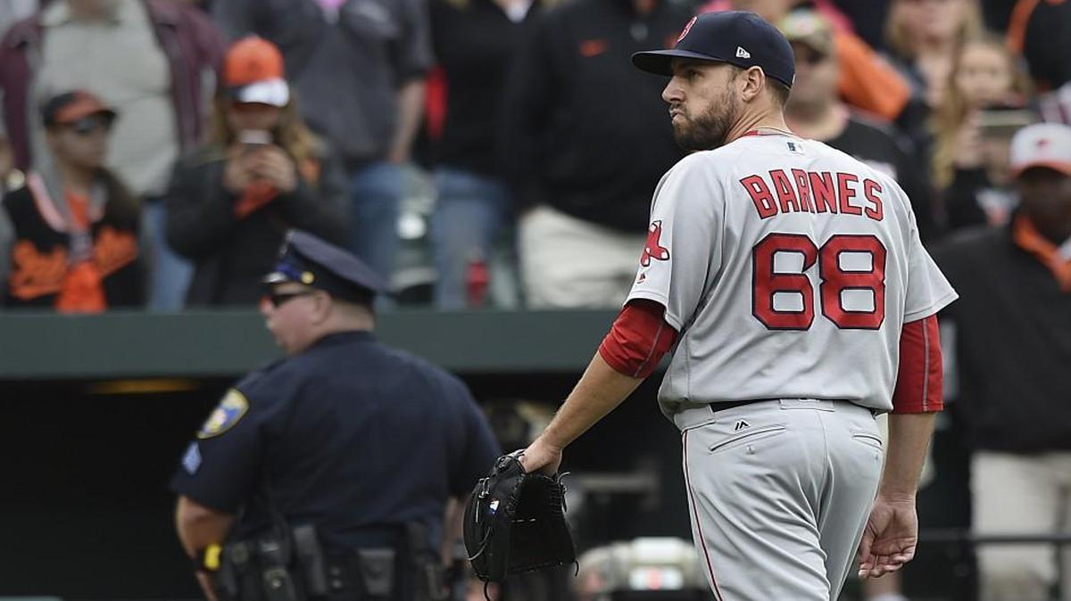 Boston Red Sox pitcher Matt Barnes walked off the field after being ejected for throwing at Manny Machado during the eighth inning of Sunday’s game.