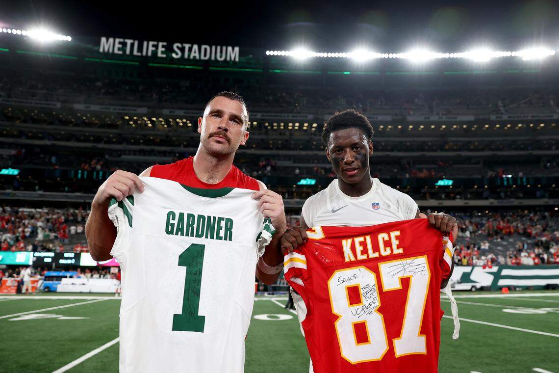 The Chiefs’ Travis Kelce and Sauce Gardner of the New York Jets trade jerseys after the game at MetLife Stadium on October 01, 2023 in East Rutherford, New Jersey.