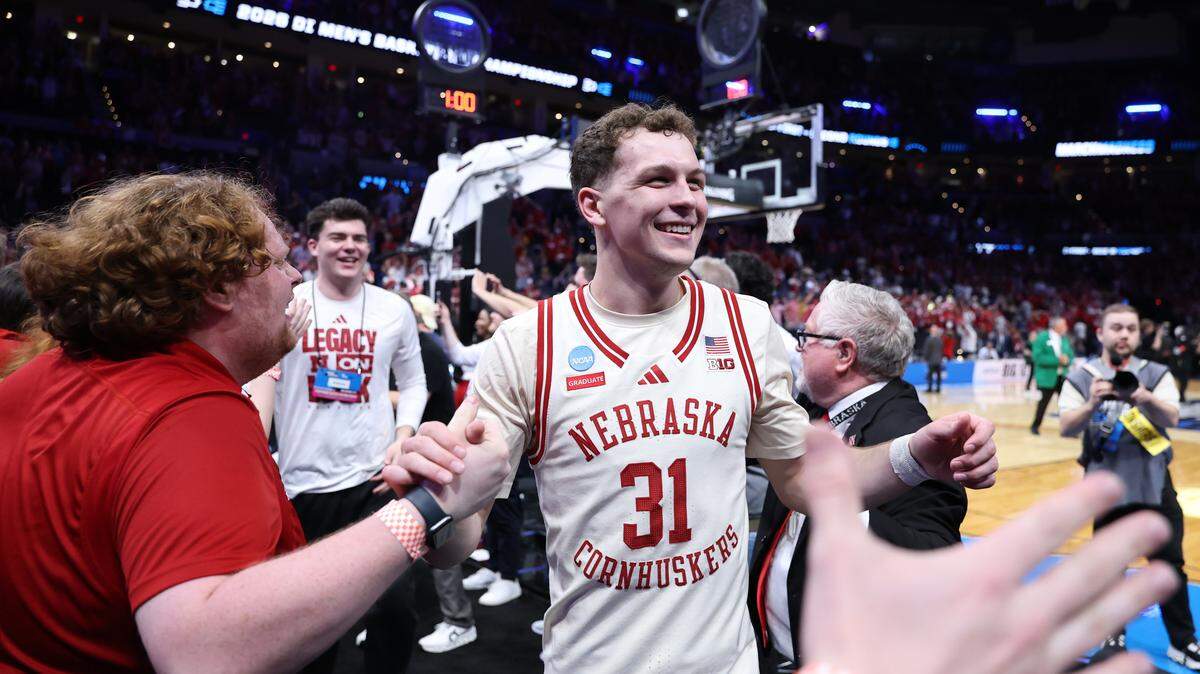 Cale Jacobsen of the Nebraska Cornhuskers celebrates after the victory against the Vanderbilt Commodores in the second round of the 2026 NCAA Men's Basketball Tournament at Paycom Center on March 21, 2026 in Oklahoma City, Oklahoma.
