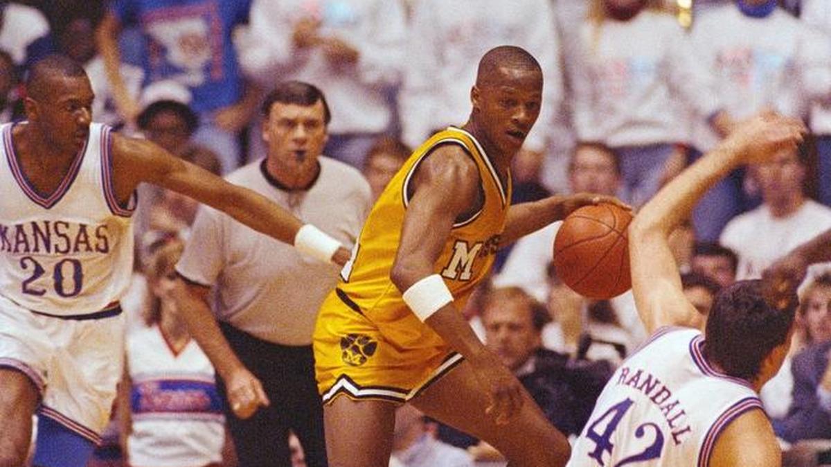Missouri guard Anthony Peeler watched Kansas forward Mark Randall hit the floor during a game in 1990.