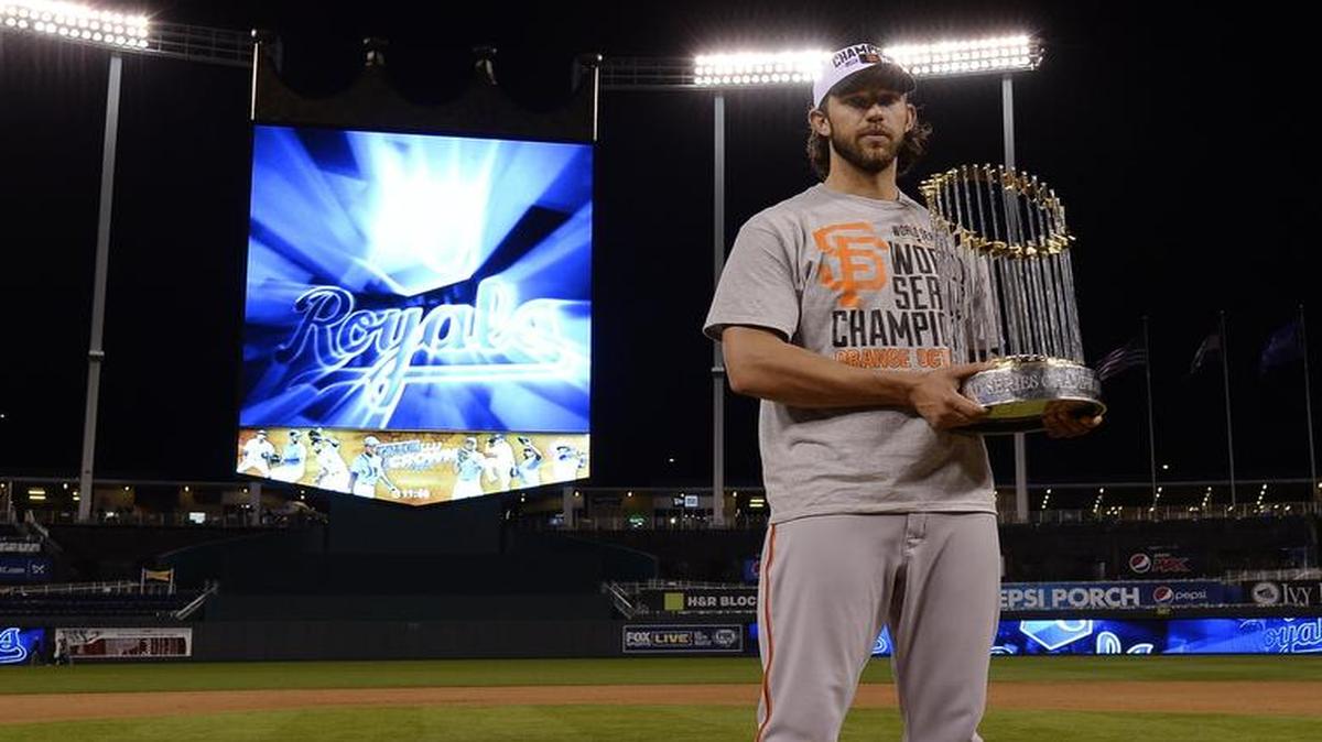 
San Francisco Giants pitcher Madison Bumgarner held the World Series trophy after game seven.
