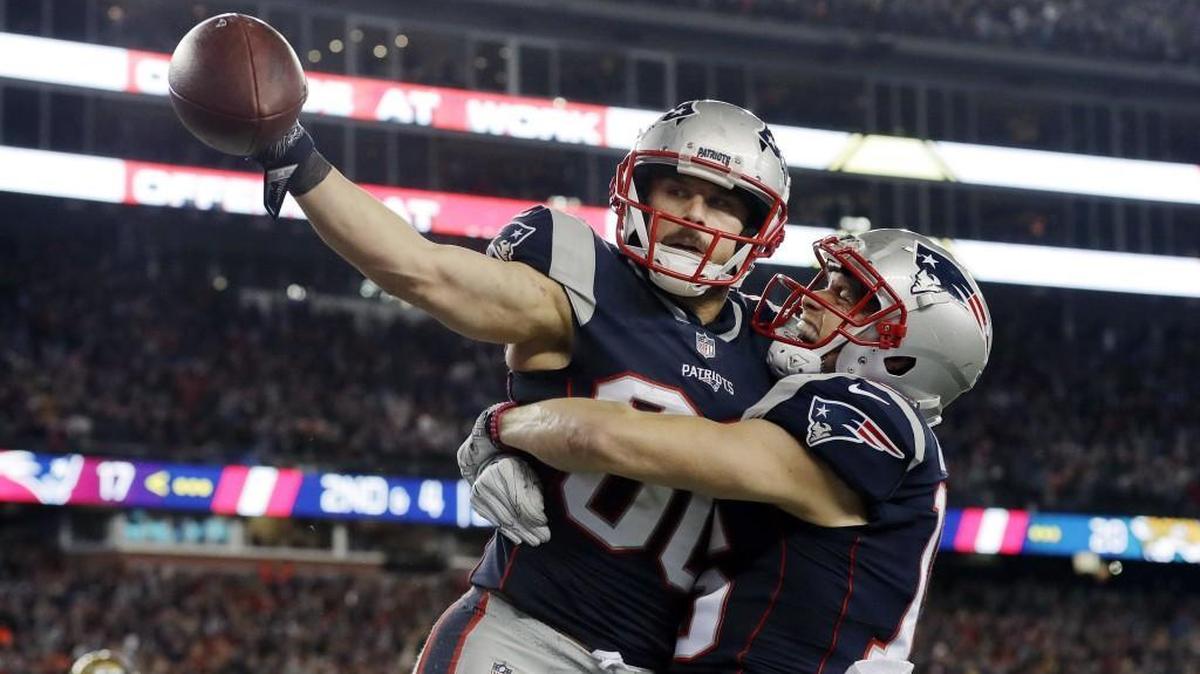 New England Patriots wide receiver Danny Amendola (left) celebrated his touchdown catch with Chris Hogan on Sunday.
