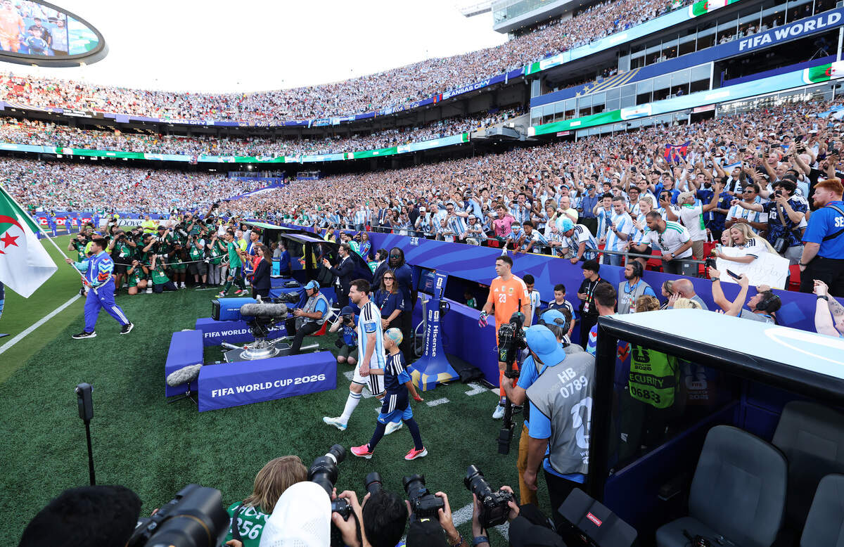 General view inside the stadium as Lionel Messi of Argentina leads his side out before the FIFA World Cup 2026 Group J match between Argentina and Algeria at Kansas City Stadium on June 16, 2026 in Kansas City, Missouri. Enoch McCleery of Blue Springs escorted Messi to the pitch.