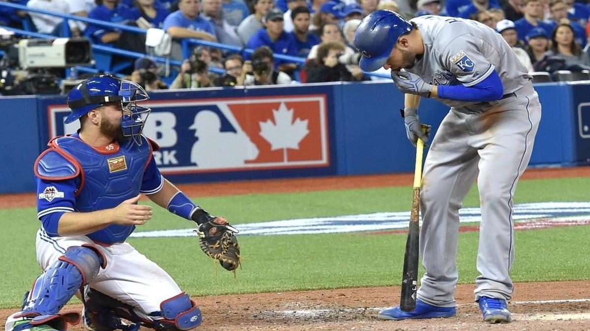 Kansas City Royals first baseman Eric Hosmer reacted to getting hit in the face on a foul ball during Monday’s ALCS game.