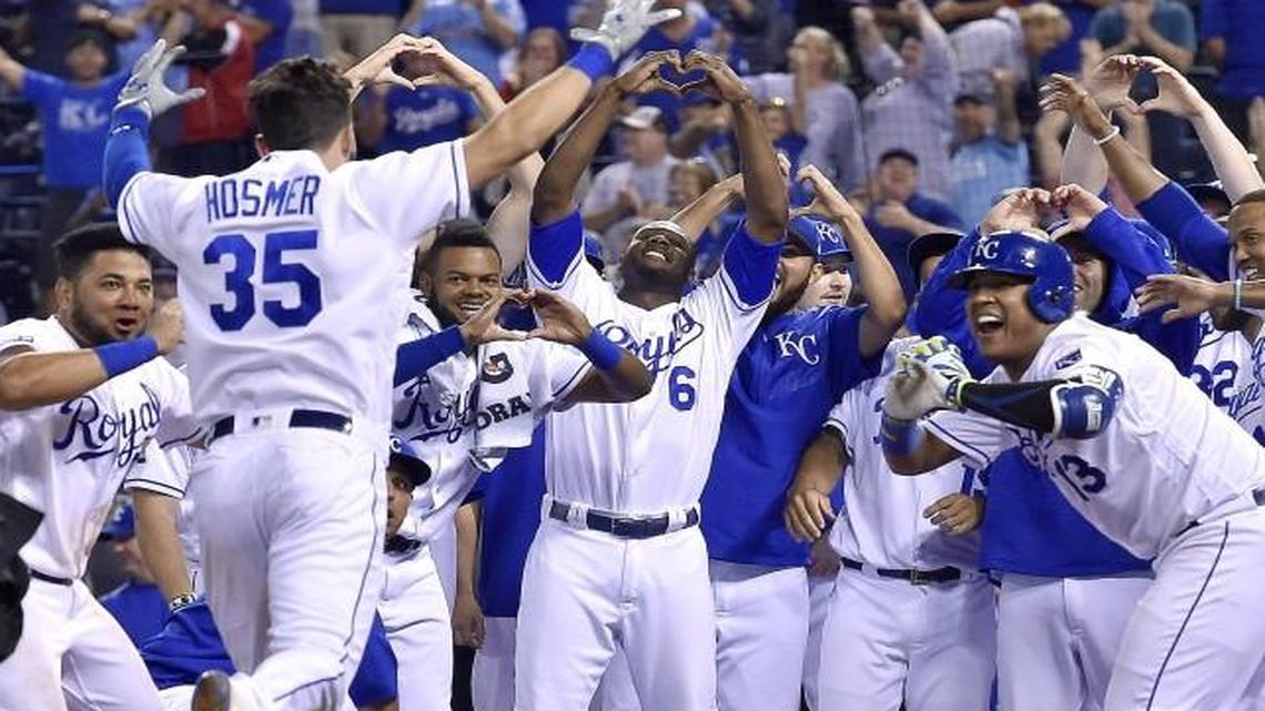 Kansas City Royals first baseman Eric Hosmer was greeted at home plate by his teammates after his game-winning, walk-off home run in the ninth inning on Wednesday.