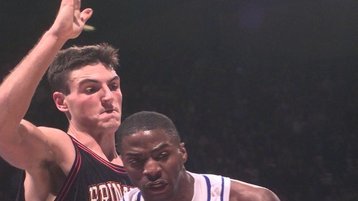 
Nick Bradford looked to get to the hoop against Chris Young.
