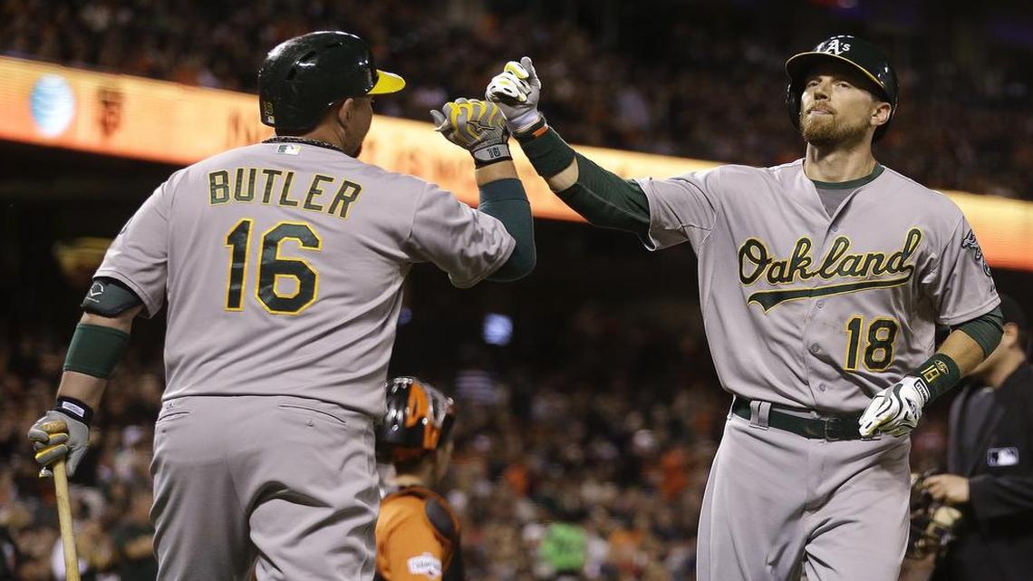 
After hitting a home run last Friday, Ben Zobrist was greeted by Billy Butler. 
