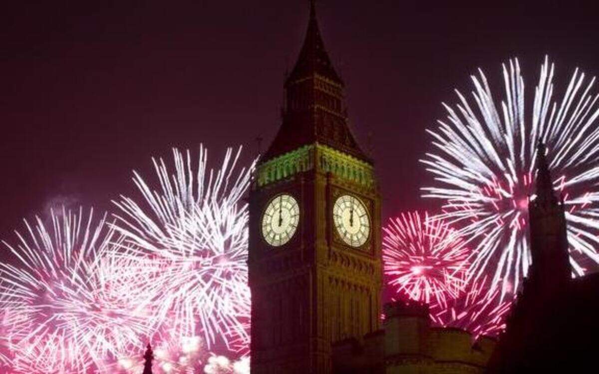 
Fireworks explode over the Houses of Parliament, including Queen Elizabeth II tower which holds the bell known as Big Ben as London celebrates the arrival of New Year’s Day on Jan. 1, 2014. 
