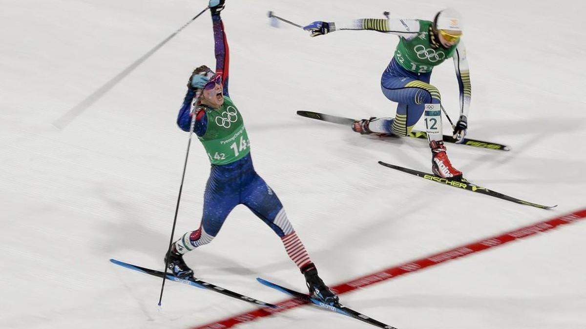 Jessica Diggins of the United States, celebrates after winning the gold medal ahead of Sweden’s Stina Nilsson in the women’s team sprint freestyle cross-country skiing final at the 2018 Winter Olympics in Pyeongchang, South Korea.