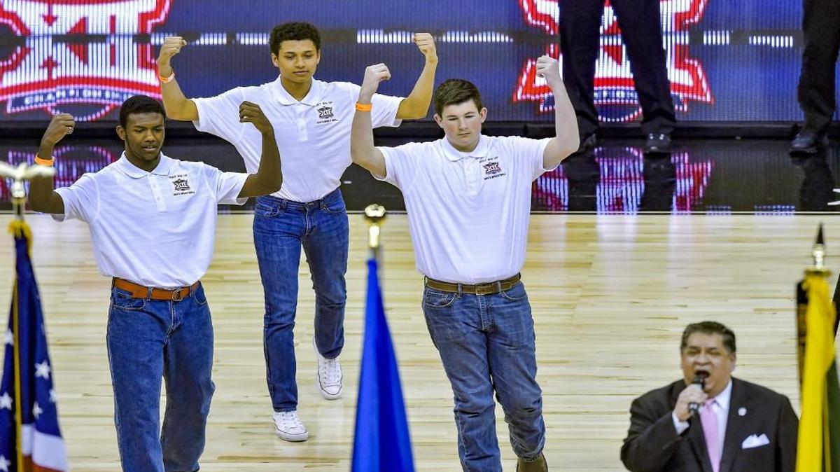 Students from the Kansas School for the Deaf signed the national anthem on Saturday at the Sprint Center.