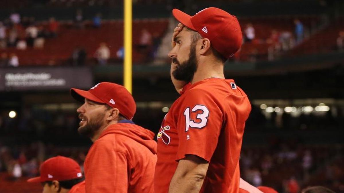 The St. Louis Cardinals Matt Carpenter and Adam Wainwright (second from left) reacted after Chicago Cubs center fielder Leonys Martin robbed a potential game-tying home run from Paul DeJong in the bottom of the 11th inning on Thursday at Busch Stadium in St. Louis. The Cubs won, 2-1.