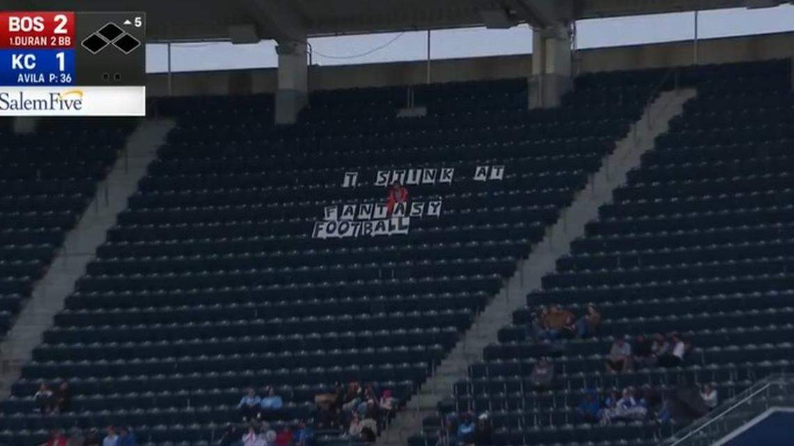 This poor guy served his fantasy-football punishment at Royals-Red Sox game