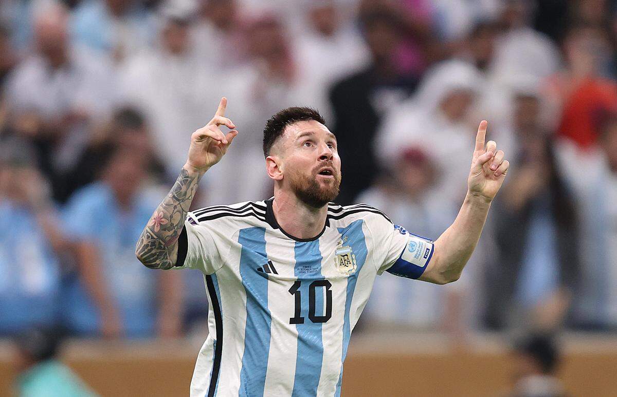 Lionel Messi of Argentina celebrates scoring after he made it 3-2 in extra time during the FIFA World Cup Qatar 2022 final match between against France at Lusail Stadium on Dec. 18, 2022 in Lusail City, Qatar.
