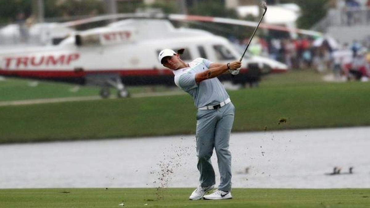 
Rory McIlroy hit from the ninth fairway during the final round of the Cadillac Championship golf tournament on Sunday. It’s difficult to tell who’s helicopter is in the background
