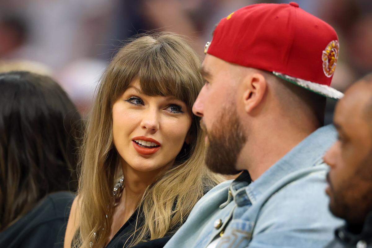 Singer Taylor Swift and Travis Kelce of the Kansas City Chiefs attend Game 3 between the New York Knicks and the Cleveland Cavaliers in the NBA Eastern Conference Finals at Rocket Arena on May 23, 2026 in Cleveland, Ohio.