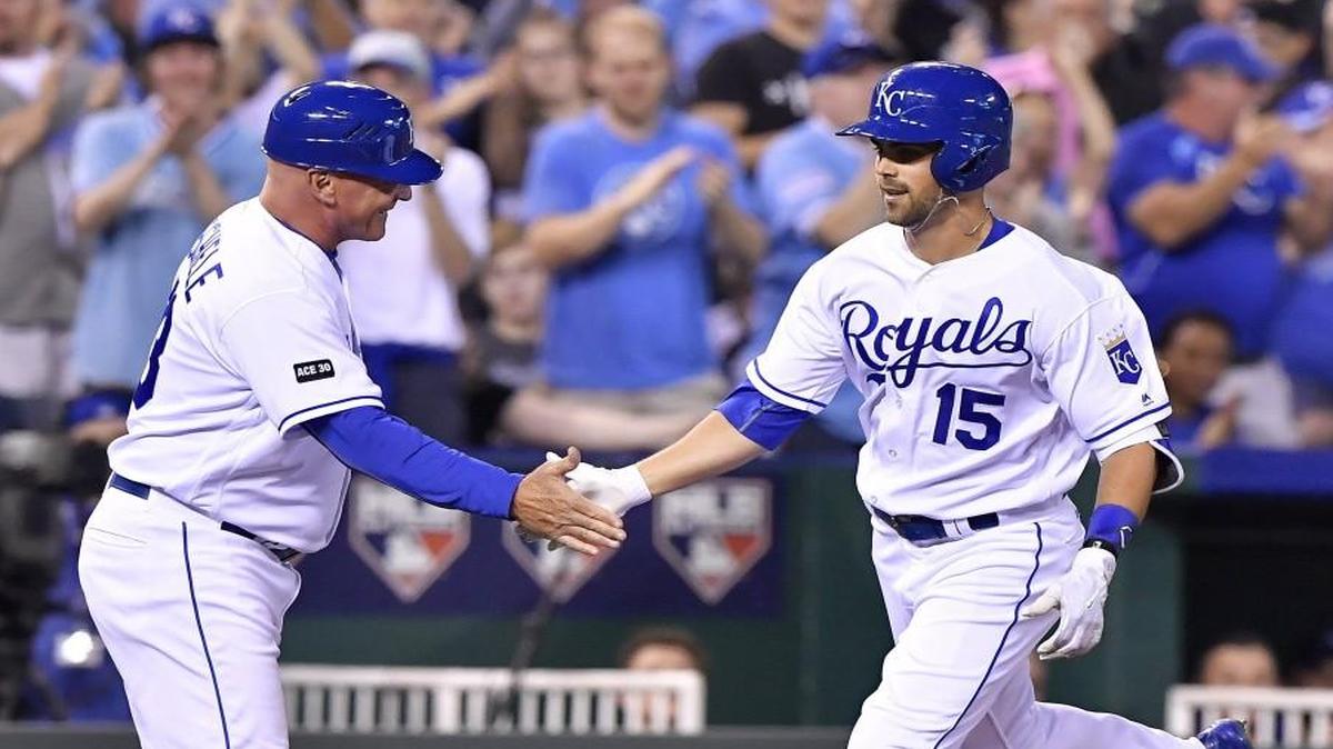 Kansas City Royals right fielder Whit Merrifield was congratulated by third-base coach Mike Jirschele after hitting a solo home run in the fifth-inning of Tuesday’s game against the San Francisco Giants at Kauffman Stadium.