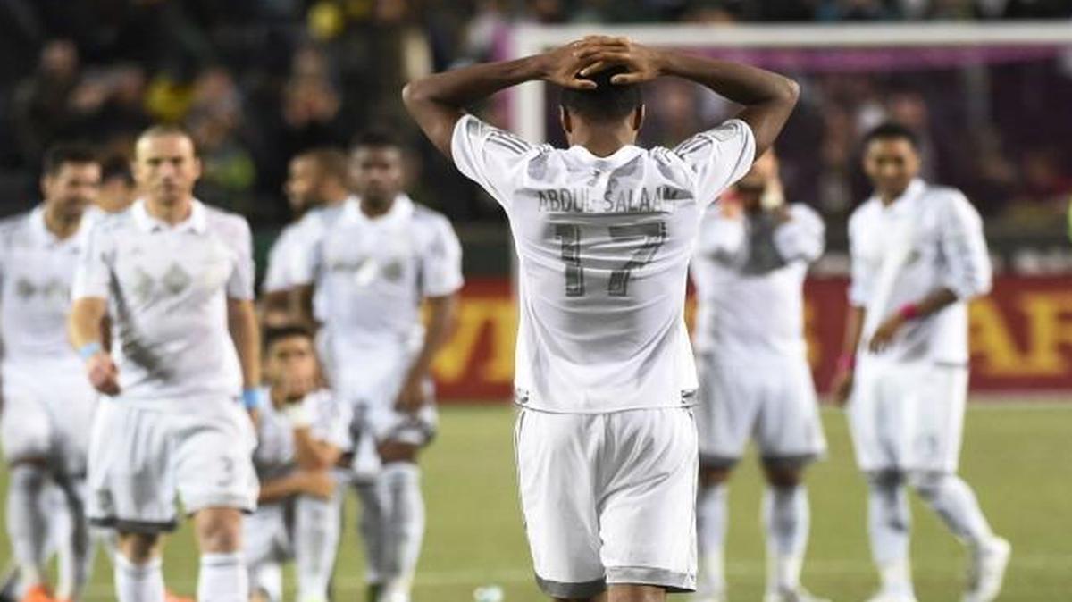 Sporting Kansas City defender Saad Abdul-Salaam walked back to his teammates after missing a kick during the shootout against the Portland Timbers.